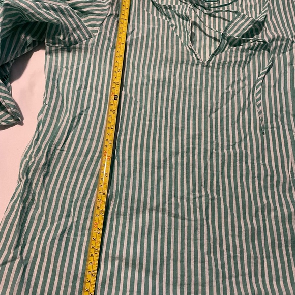 Cute lightweight summer top. Seersucker fluted sleeve top with tie at neckline. - Picture 5 of 5